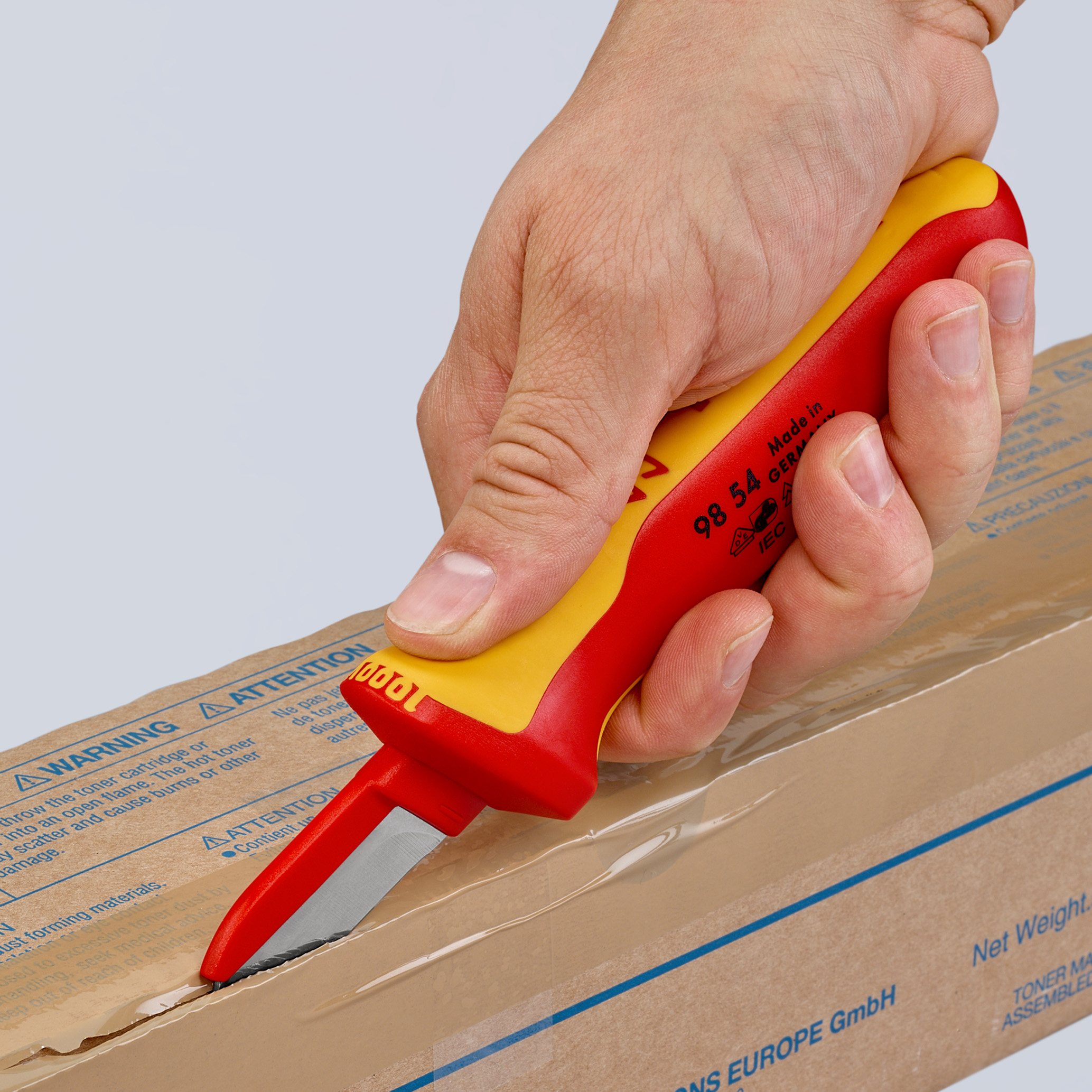 Couteau d'électricien pour câbles avec capuchon isolé lame recouverte KNIPEX - 9854
