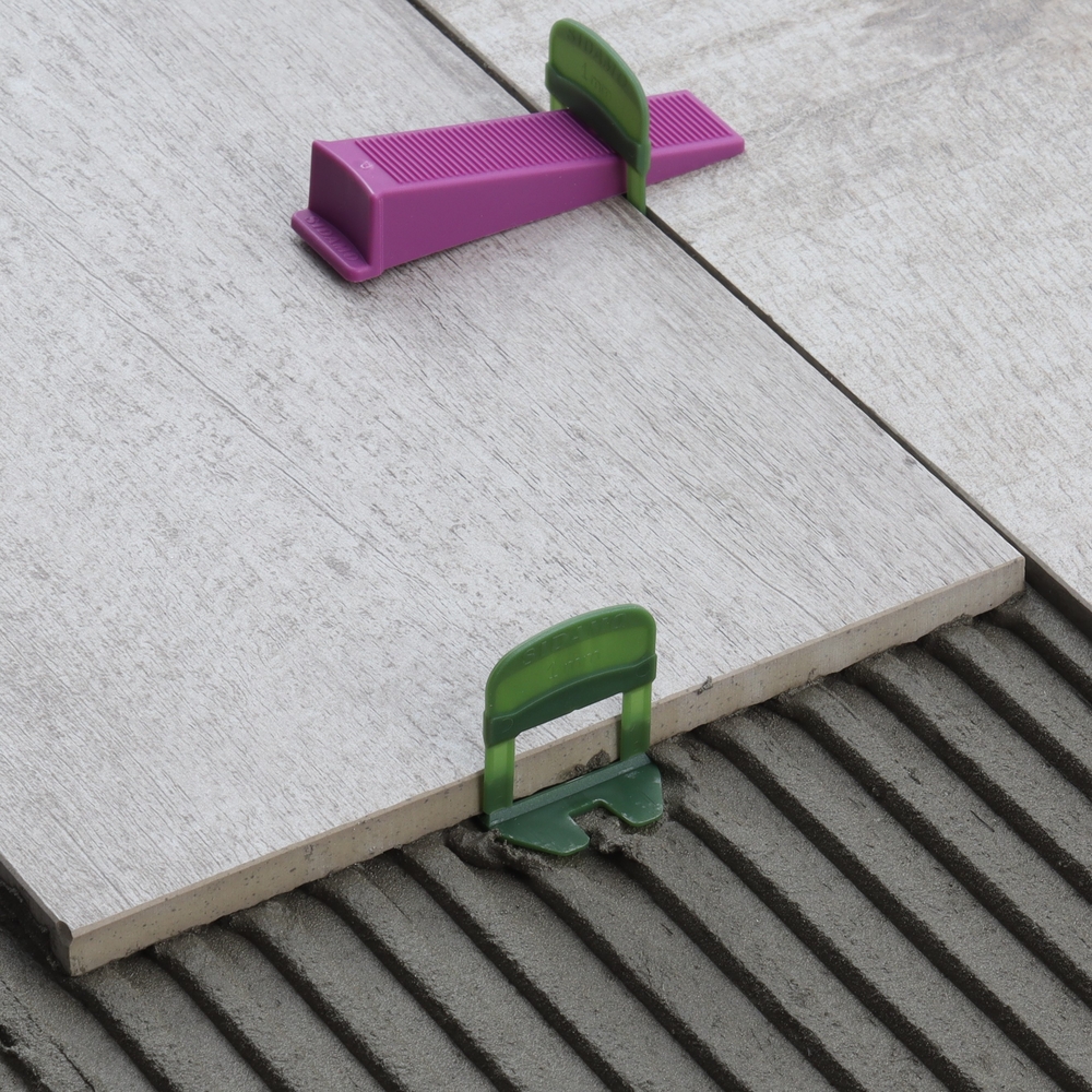 Kit pour croisillons auto-nivelants avec joint de 1 mm pour un carrelage à niveau et des joints réguliers SIDAMO - 11255321