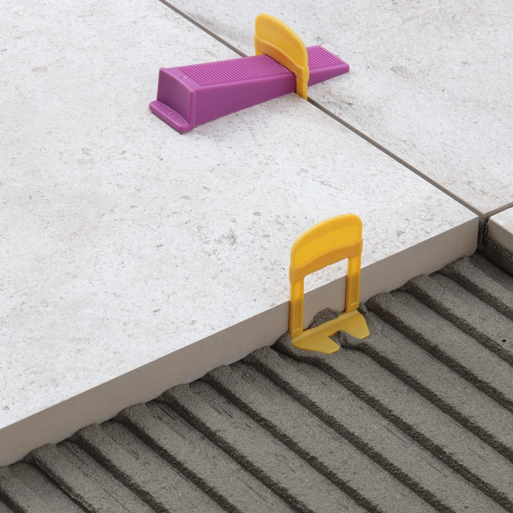 Kit pour croisillons auto-nivelants avec joint de 2 mm H 20 pour carrelage de niveau et joints réguliers. SIDAMO - 11255324