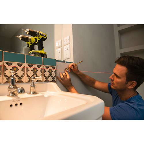 Laser croix rouge - portée 10 m - précision +/- 0,5 mm - Livré avec une pince de fixation et 2 piles RYOBI - 5133004863