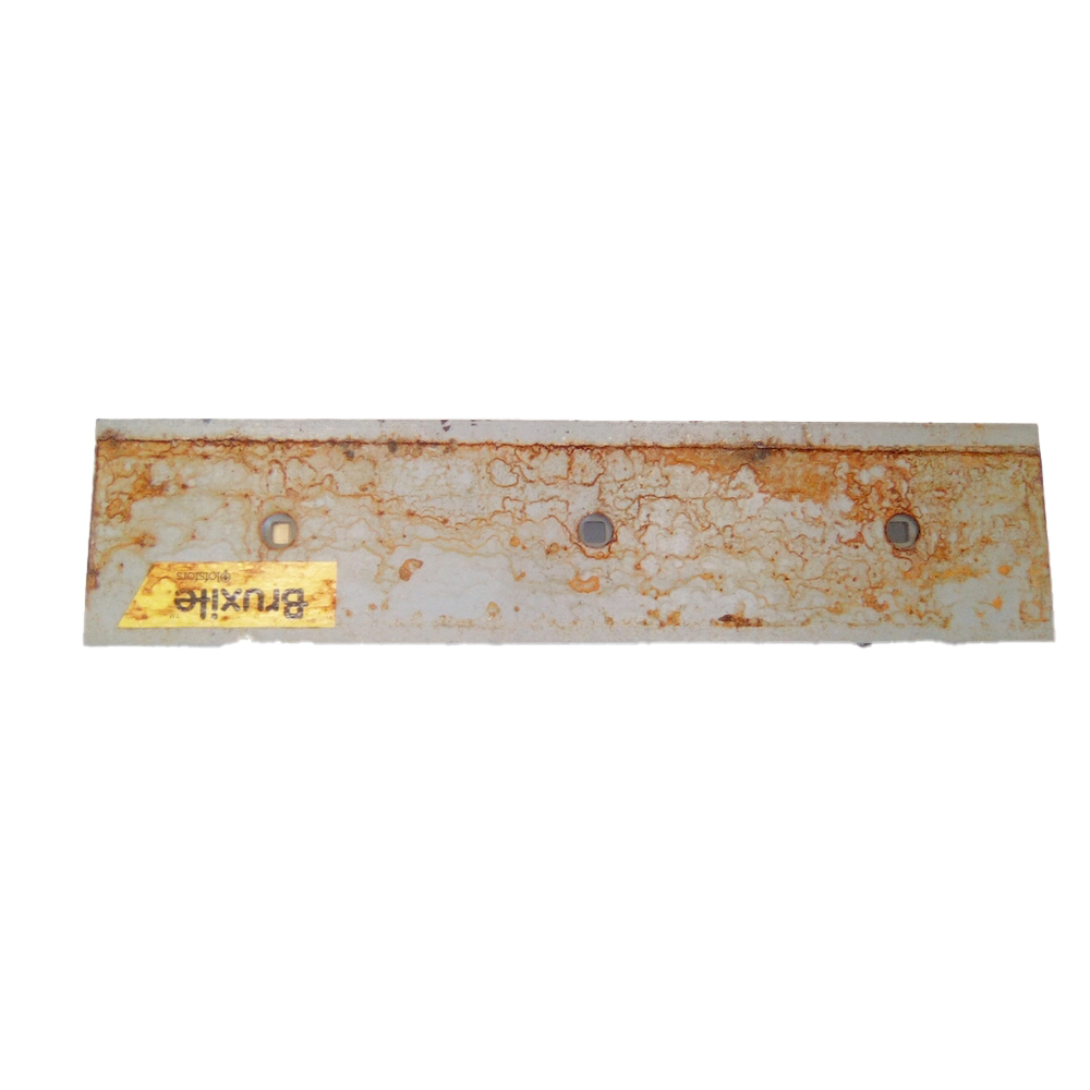 Contre lame de godet centrale reversible 3 trous en 1